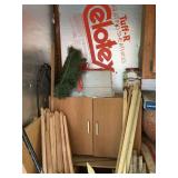 Gardening stakes, cabinet, potato fork and sawhorses