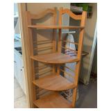 Corner shelf with ironing board