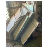 Assorted pieces of plywood and siding
