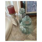Glass jars with lids and candle holder