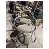 Chrome and Upholstered Swivel Chairs