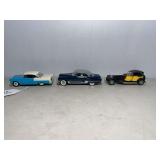 Diecast Car Models: 1955 Chevy, 1949 Cadillac, and Black & Yellow Car