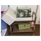 Universal Super Zigzag Sewing Machine with Case, Green Toolbox on Two tiered rolling cart