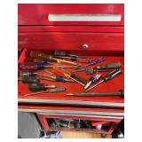 Screwdrivers, air wrench and a knife