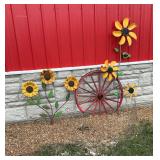 Decorative metal flowers, and wagon wheel