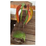 Cooler, tarp and yard art