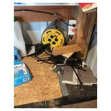 Workbench top contents, contents on wall and behind bench