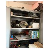 Two metal shelving units with contents