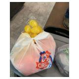 Easter egg artificial flowers in plastic tote