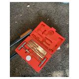 Miscellaneous lopping shears, pliers, and tire repair kit