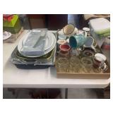 Assorted Kitchenware Collection Including Serving Trays, Mugs, and Utensils