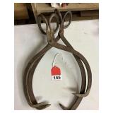 2 sets of Ice tongs used to load grandmother