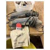 2 Bosch Corner sanders Model B7000 with a pail of new sanding discs