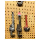 3 Ridgid pipe wrenches and 1 auto adjust