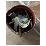 Metal bucket assorted items, including gate lag screws