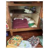 Assorted kitchen linens and tablecloths
