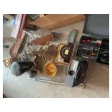 Assortment of household decor, fishing lures, projector, and more