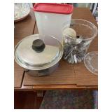 Silverware, cooking pan and plastic storage box