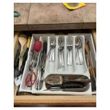 Silverware drawer and assorted kitchen utensils