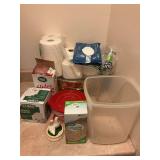 Miscellaneous plastic bags, plastic containers, toilet paper, and charging cords