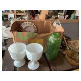 Milk glass, green juice bottle, large strainer, and other glass items