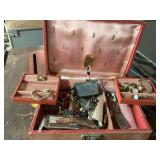 Vintage jewelry box with assorted tie clips, money clips, women’s watches, and other assortment of items