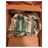 Blue Atlas and ball canning jars with miscellaneous items