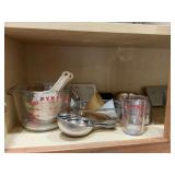 Measuring cups and assorted glassware