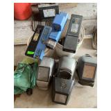 Large assortment of welding rods, and welding helmets