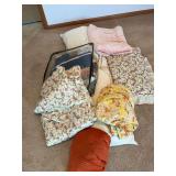 Assorted bedding and pillows