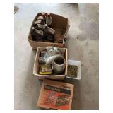 Assortment of nails screws and potentially used motor oil