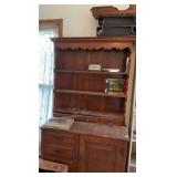 Wooden cabinet with contents