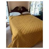 Queen size bed frame with mattress, box springs, and bedding