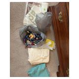 Crosstitch pillowcase with assortment of embroidery thread and pearl 3 thread
