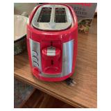 Red Hamilton Beach Toaster, bundt cake pan, & glass rolling pin