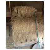 Straw bales and two bags of bedding flakes