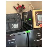 Contents on top of filing cabinet