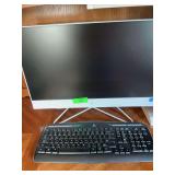 HP three and one computer with keyboard