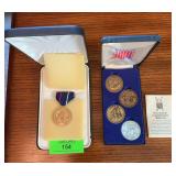 4 commemorative metals and presidential award
