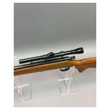 Stevens 22 short or long rifle model number 15 with scope