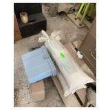 Sandbag and three plastic file boxes