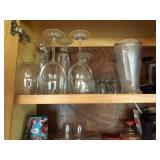 Contents of top two shelves in cabinet
