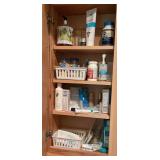 Contents of two medicine cabinets, hairspray, cologne, various bathroom health aids