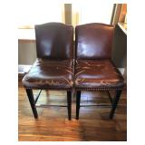 Two leather 26 inch barstools