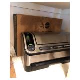 Food Saver and box of vacuum sealer bags