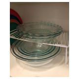 Pyrex storage bowls, two large Pyrex pie plates and lids