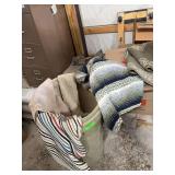 Plastic trash cans with rugs/blankets