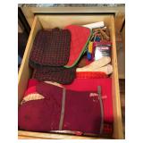 Two drawers of potholders, masking tape and other assorted items