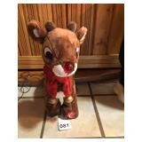 Rudolph the reindeer, just squeeze his hoof and his nose lights up and he sings and runs across the floor, runs several feet, vintage