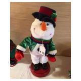 Shake your booty Snowman that twirls around and sings, lots of action